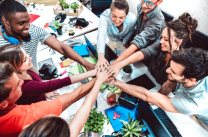 A group of employees in a huddle